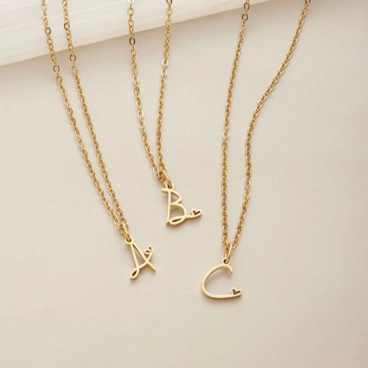 GOLD LETTER HEART NECKLACE
