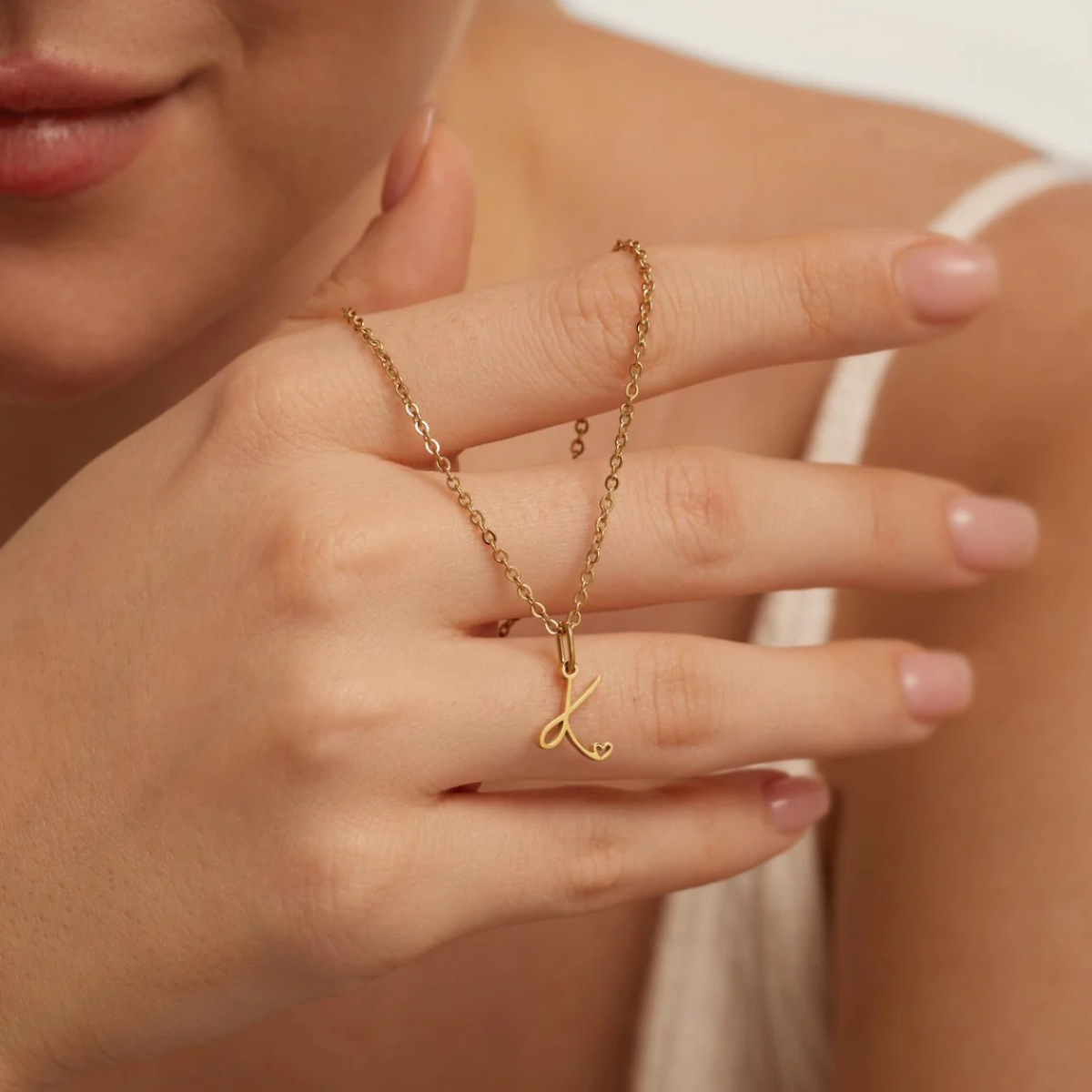 GOLD LETTER HEART NECKLACE